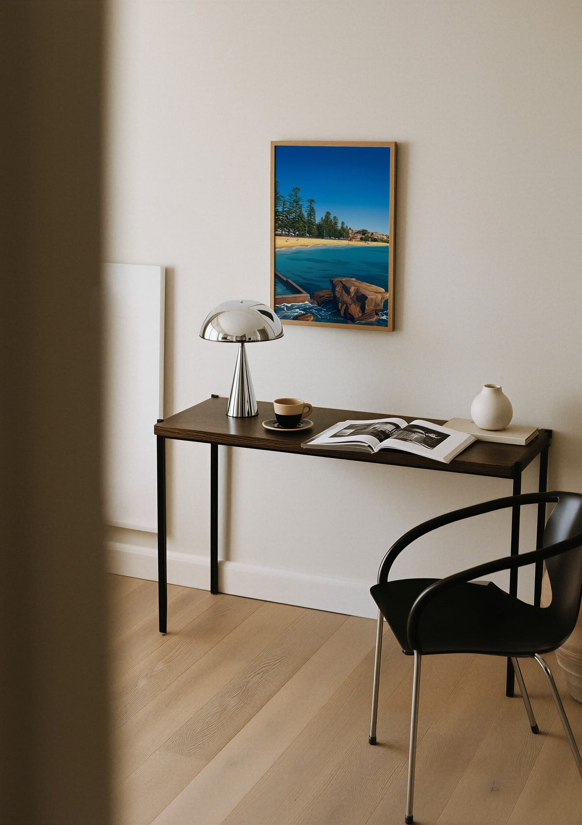 Pine Shore print shown on a wall above a desk