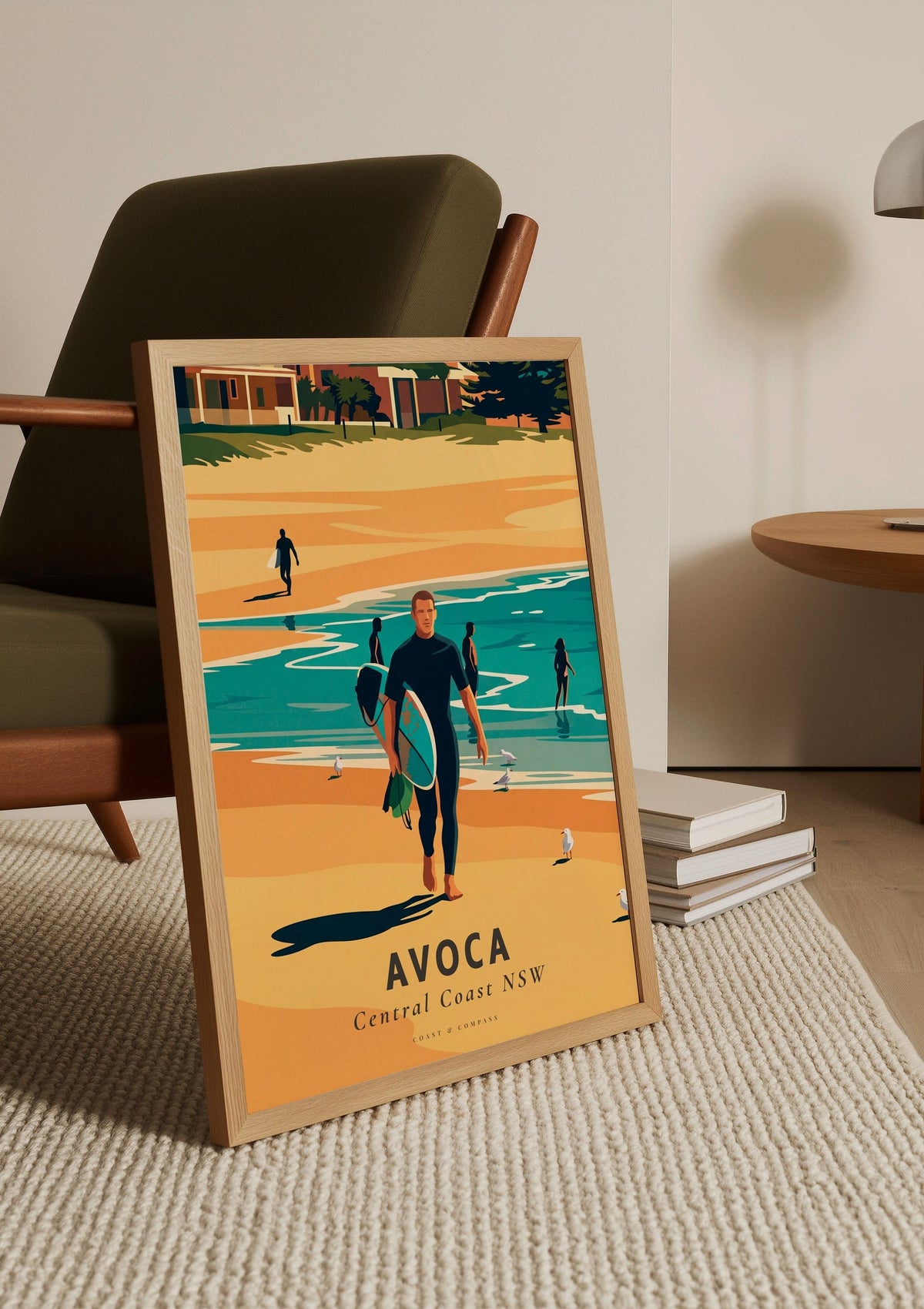 Avoca Beach Surfer travel poster shown unframed, leaning against a chair