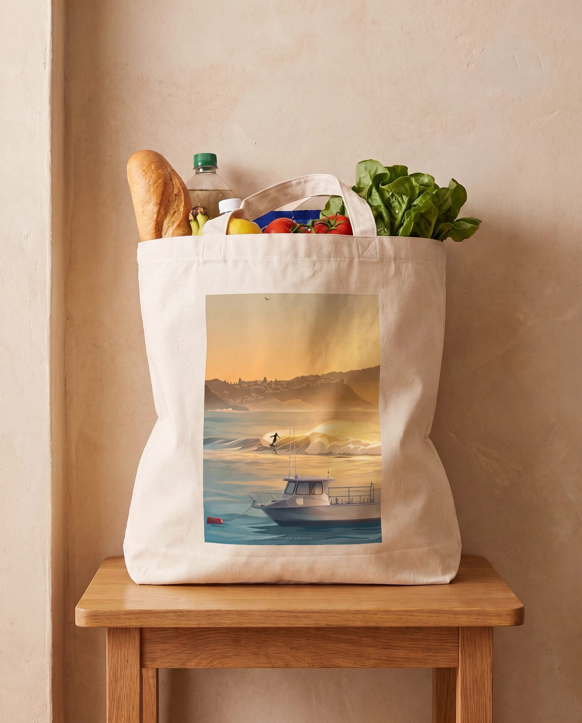 Coast & Compass Dawn Patrol tote bag packed with fresh groceries, cream cotton canvas printed with the Dawn Patrol artwork