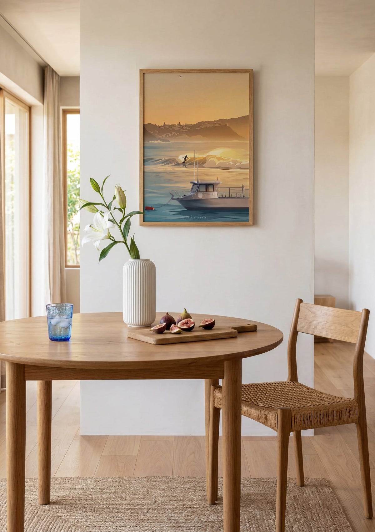Dawn Patrol print shown above a round dining table