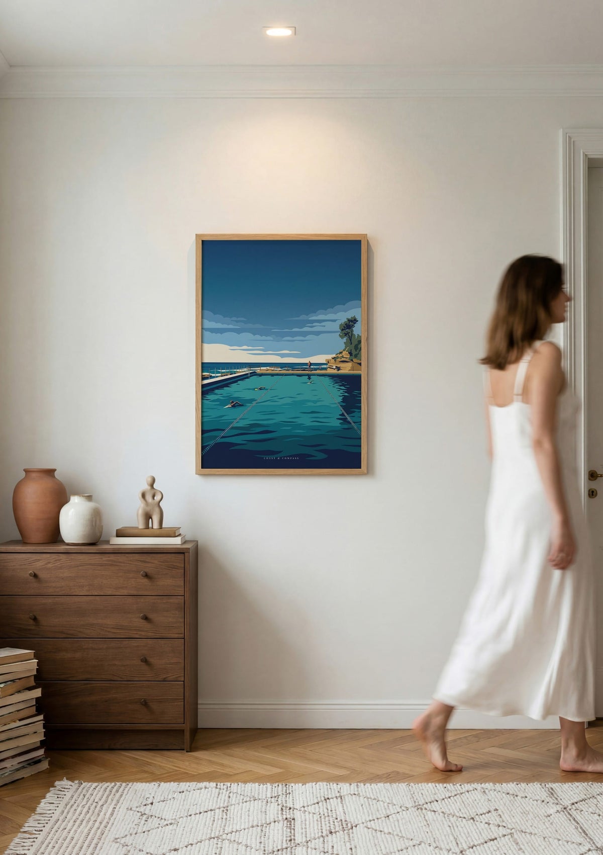 Lap Lines print shown on a wall as a woman walks past
