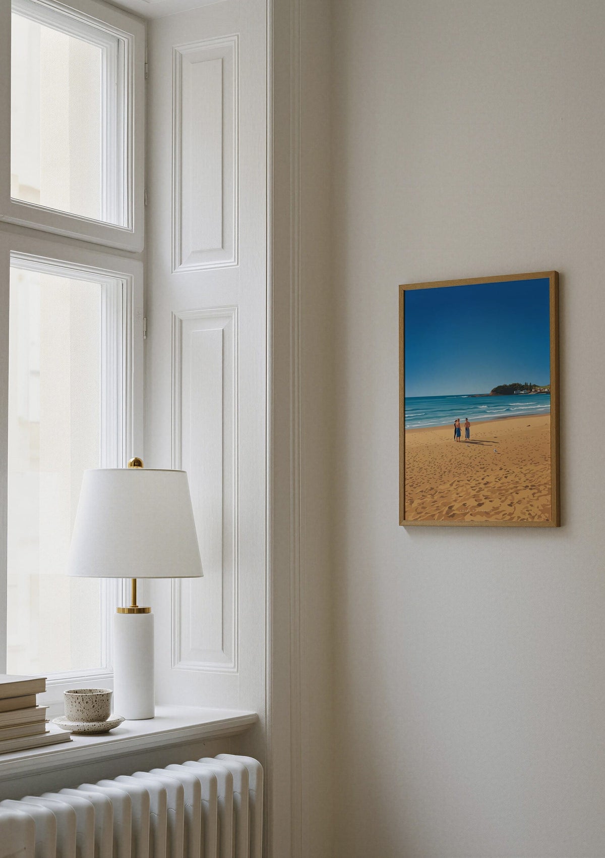 Shoreline Gathering print shown on a wall beside a window