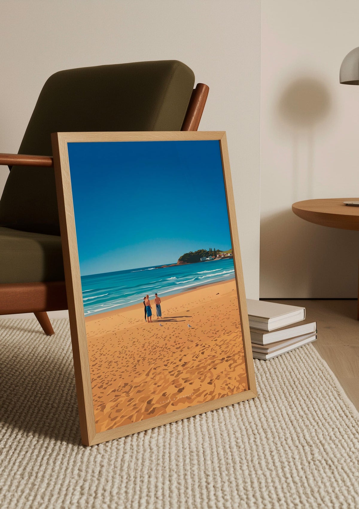 Shoreline Gathering print shown unframed, leaning against a chair