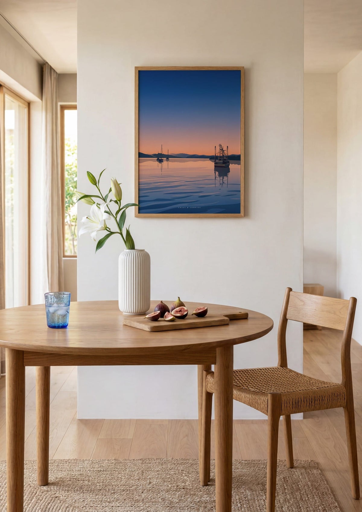 Still Waters print shown above a round dining table