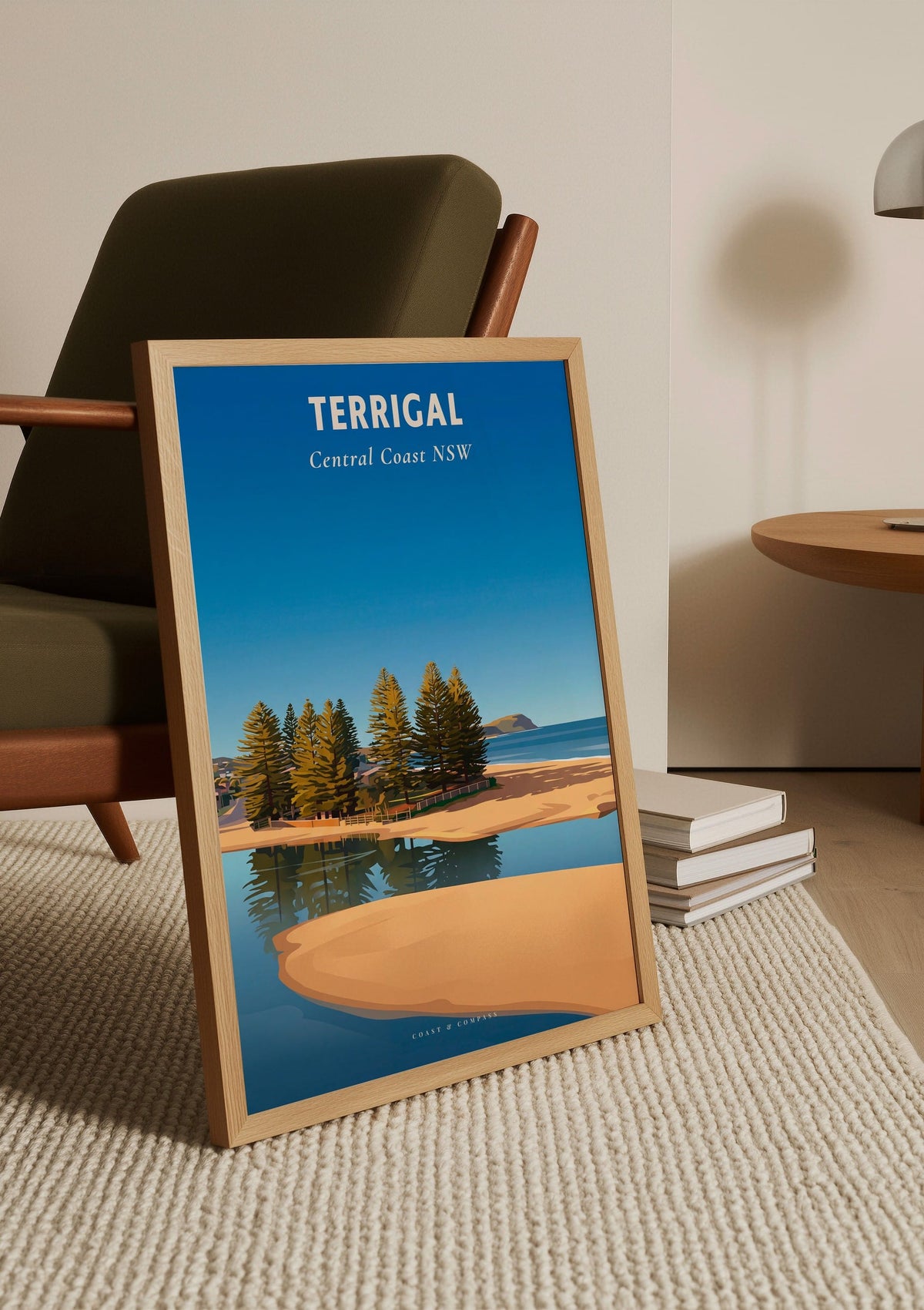 Terrigal Pines travel poster shown unframed, leaning against a chair