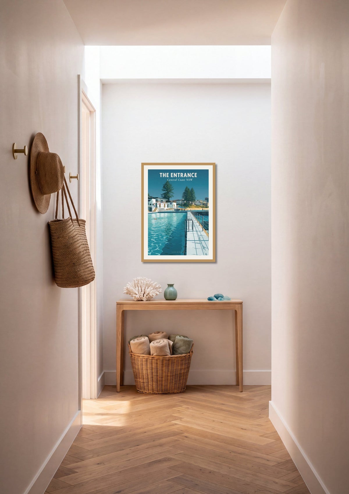 The Entrance Ocean Baths travel poster shown at A1 size on a hallway wall