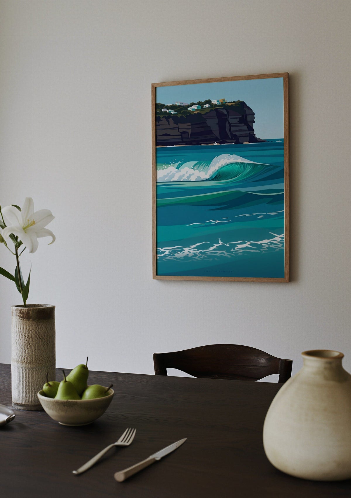 Turquoise Break print shown above a dining table set with a bowl of pears