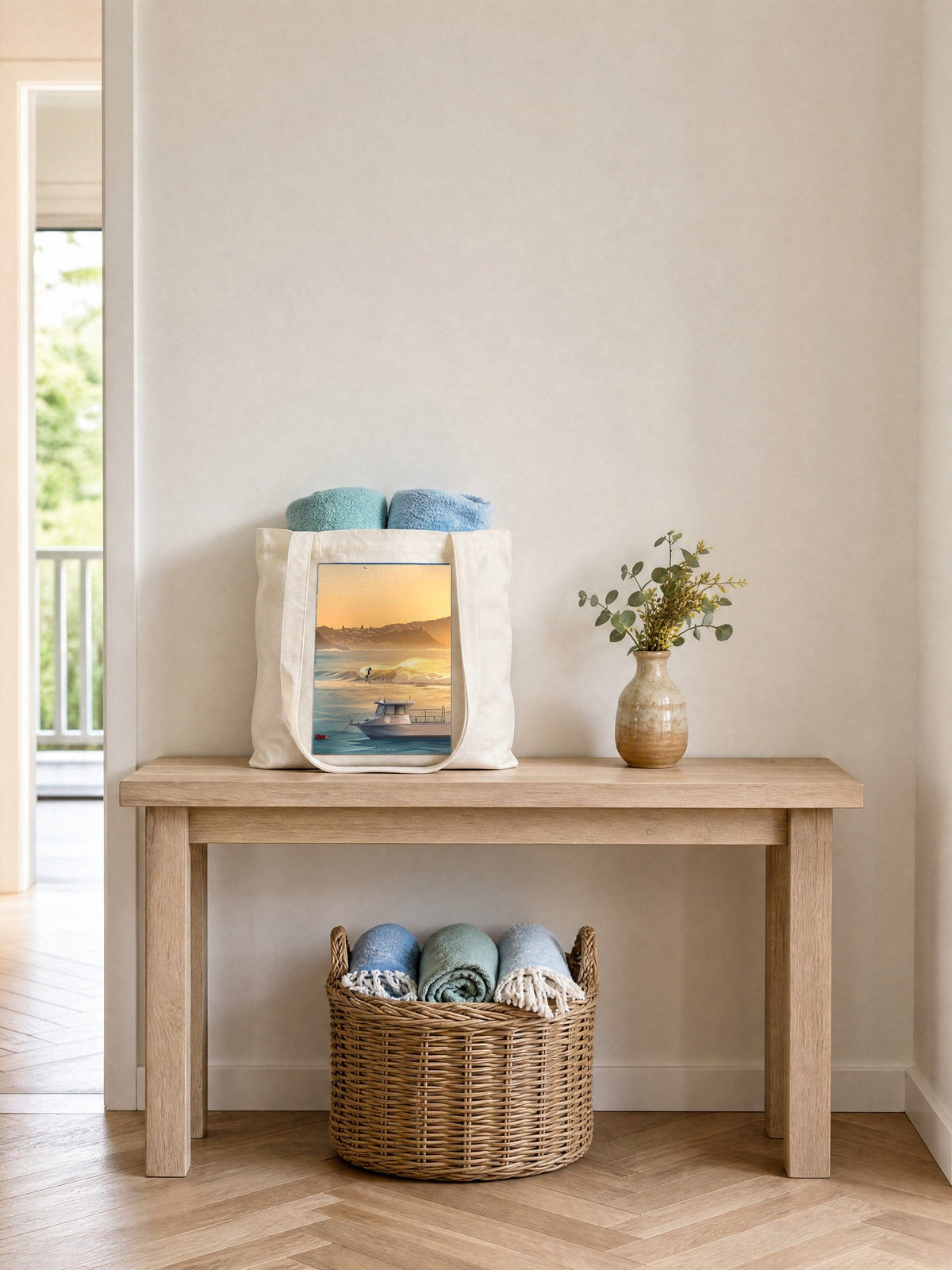 Dawn Patrol tote bag on an entry hall table, cream cotton canvas printed with the Dawn Patrol artwork
