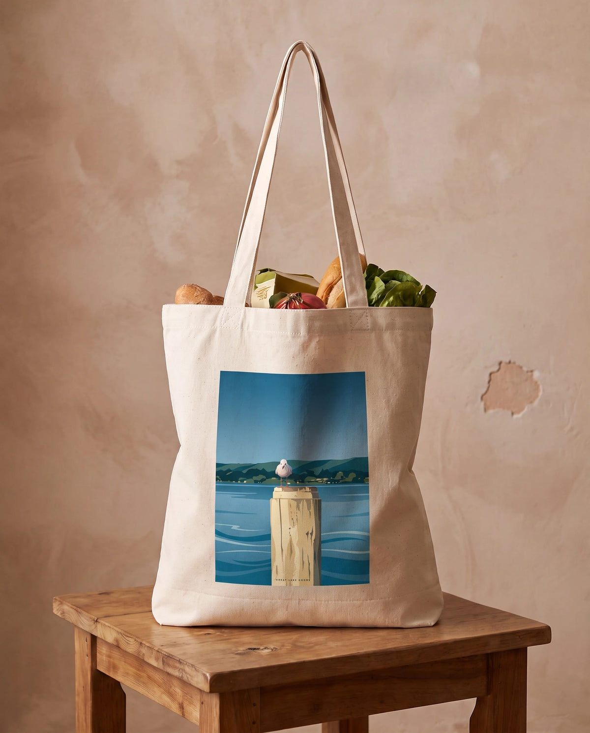 Coast & Compass Harbour Watch tote bag packed with fresh groceries, cream cotton canvas printed with the Harbour Watch artwork