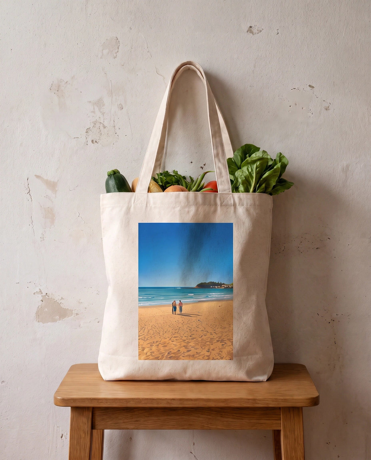 Coast & Compass Shoreline Gathering tote bag packed with fresh groceries, cream cotton canvas printed with the Shoreline Gathering artwork