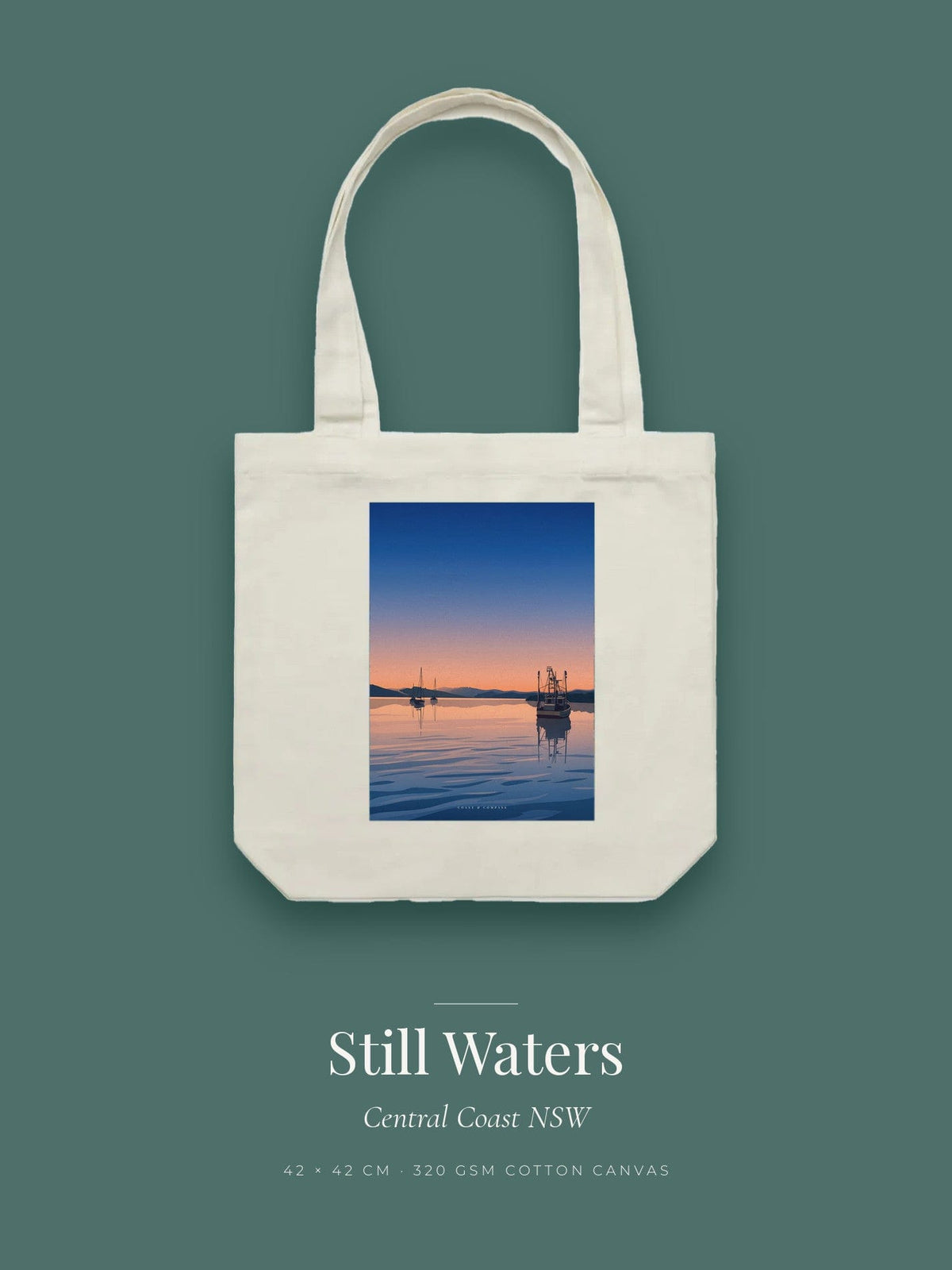 Still Waters artwork printed on a cream cotton canvas tote bag — a trawler and yachts reflected on glassy water at dusk