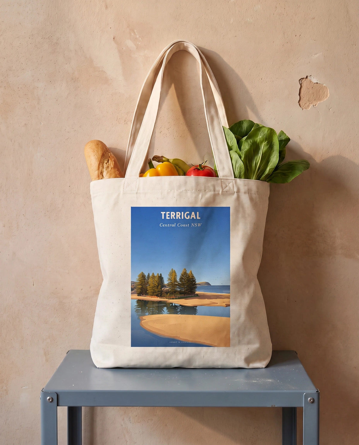 Coast & Compass Terrigal Pines tote bag packed with fresh groceries, cream cotton canvas printed with the Terrigal Pines Central Coast NSW poster design