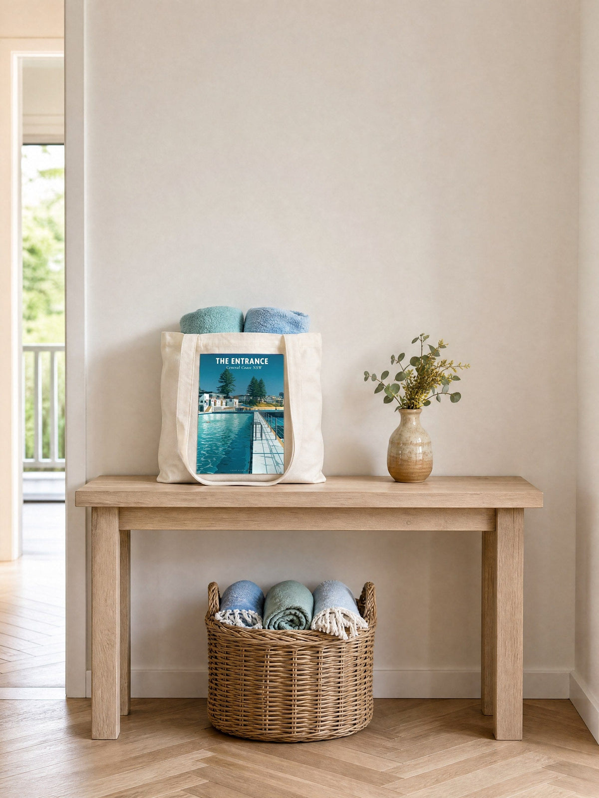 Coast & Compass The Entrance tote bag on a timber hall console with rolled beach towels, printed cotton canvas